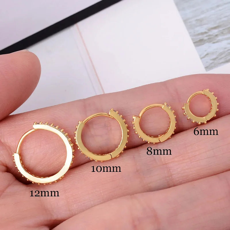 Aretes Aura Huggie – Plata 925 y Zirconia